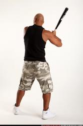 Man Adult Athletic Black Standing poses Casual Fighting with bat